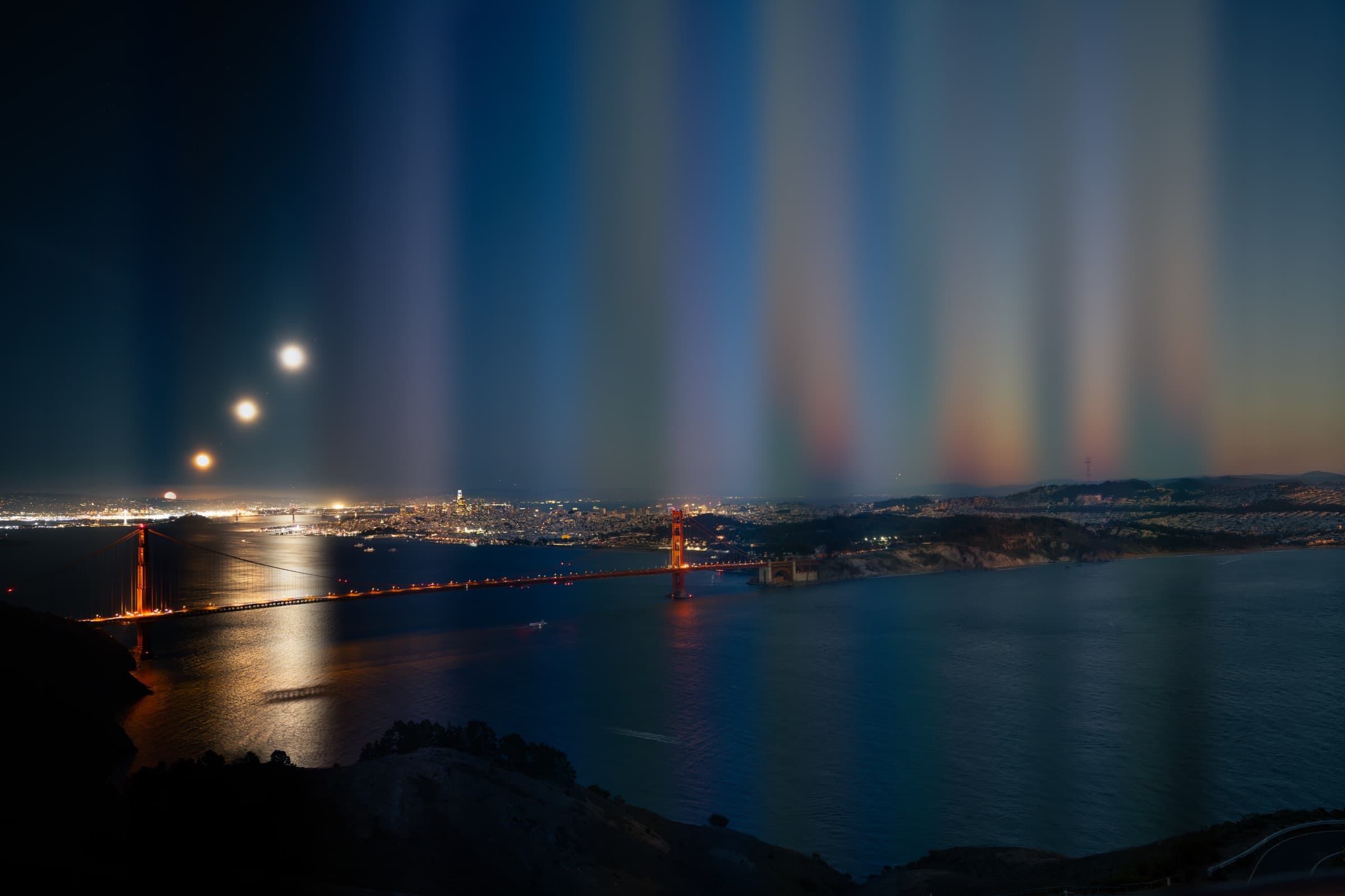 Golden Gate Bridge and the San Francisco skyline at night